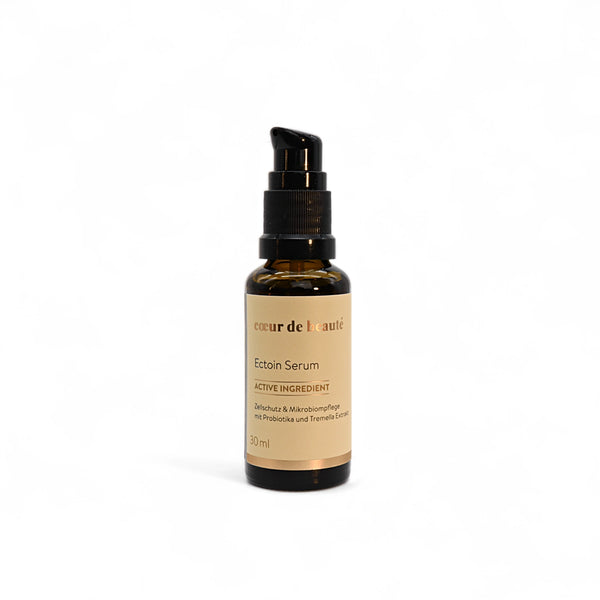 cœur de beauté Ectoin Serum mit Zellschutz und Microbiompflege mit pastel gelbem Etikett und rose goldenem Logo
